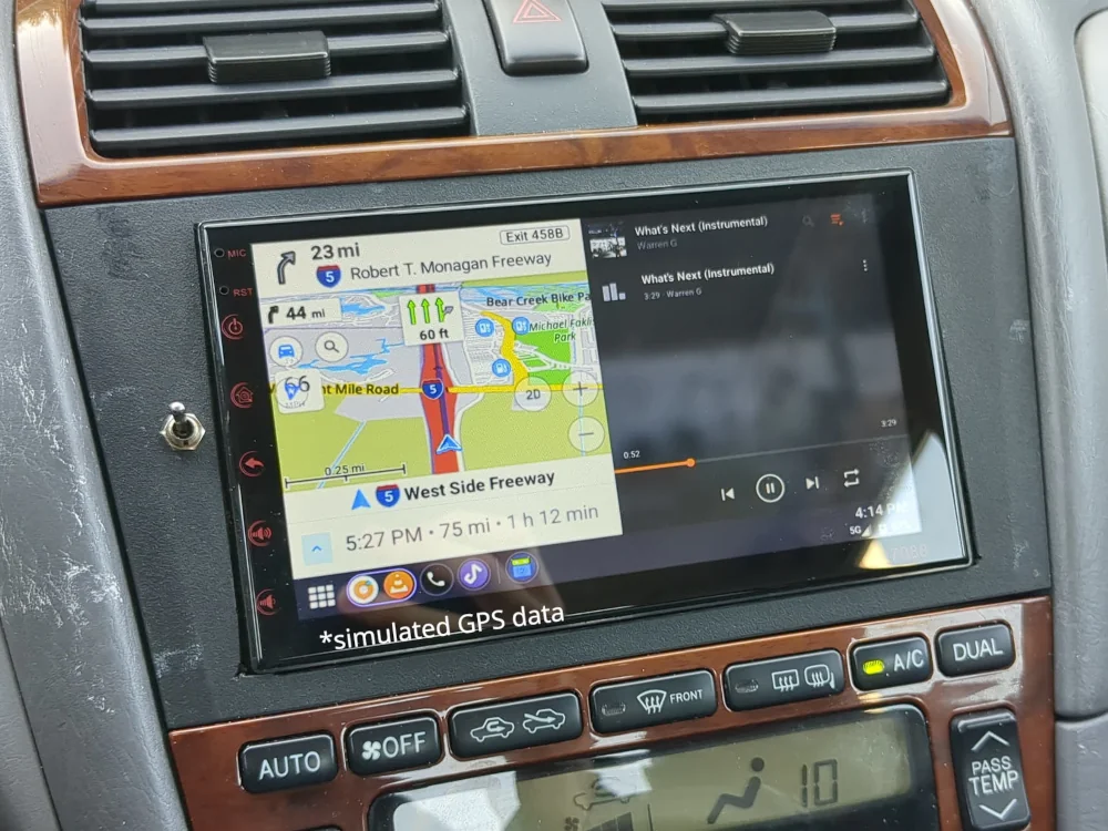 Picture of Flywheel with a map and some music open in split-screen on my car headunit. The GPS data is simulated.
